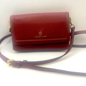 MK red crossbody with back phone pocket
